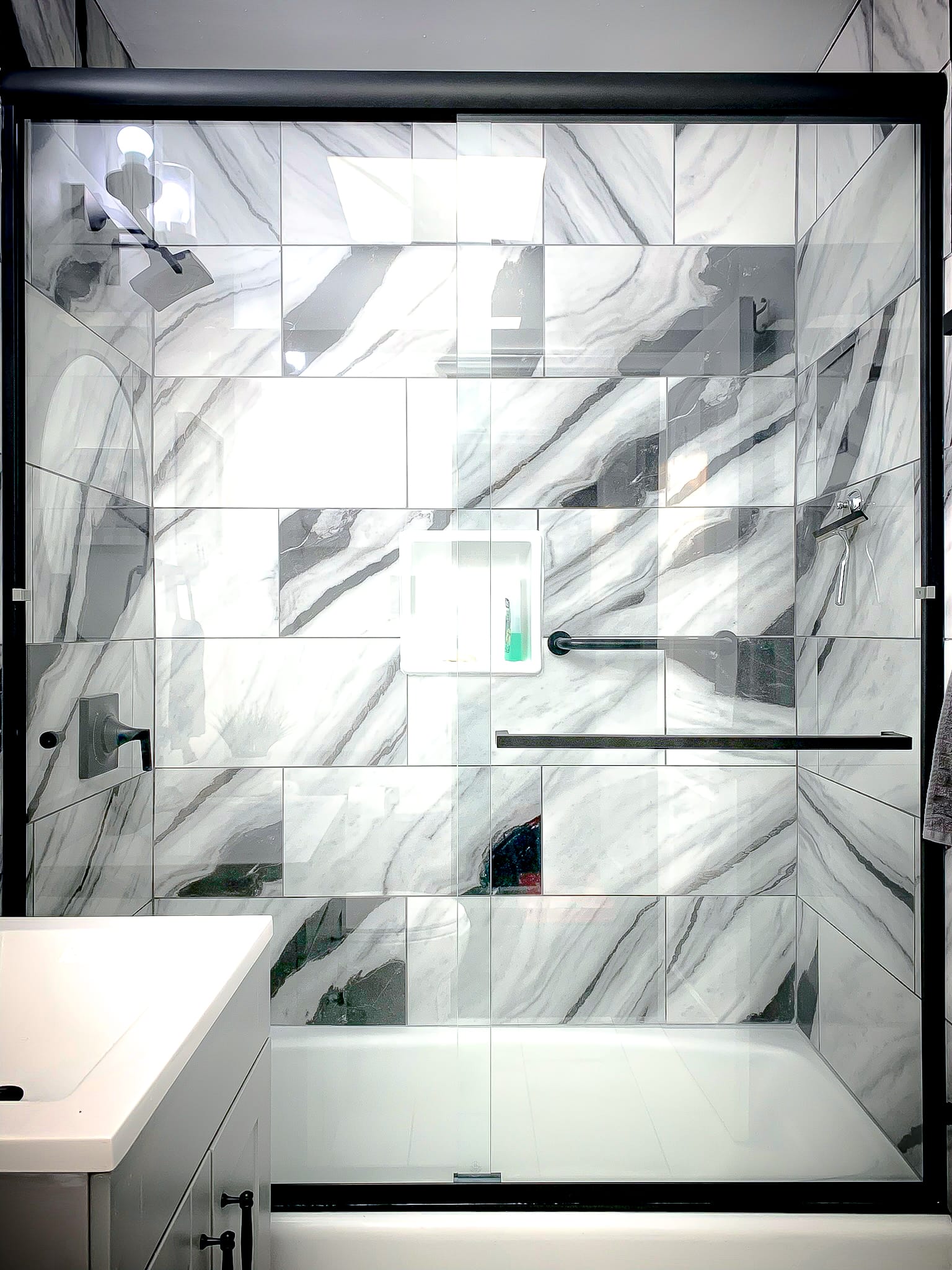 Bypass slider shower door installation